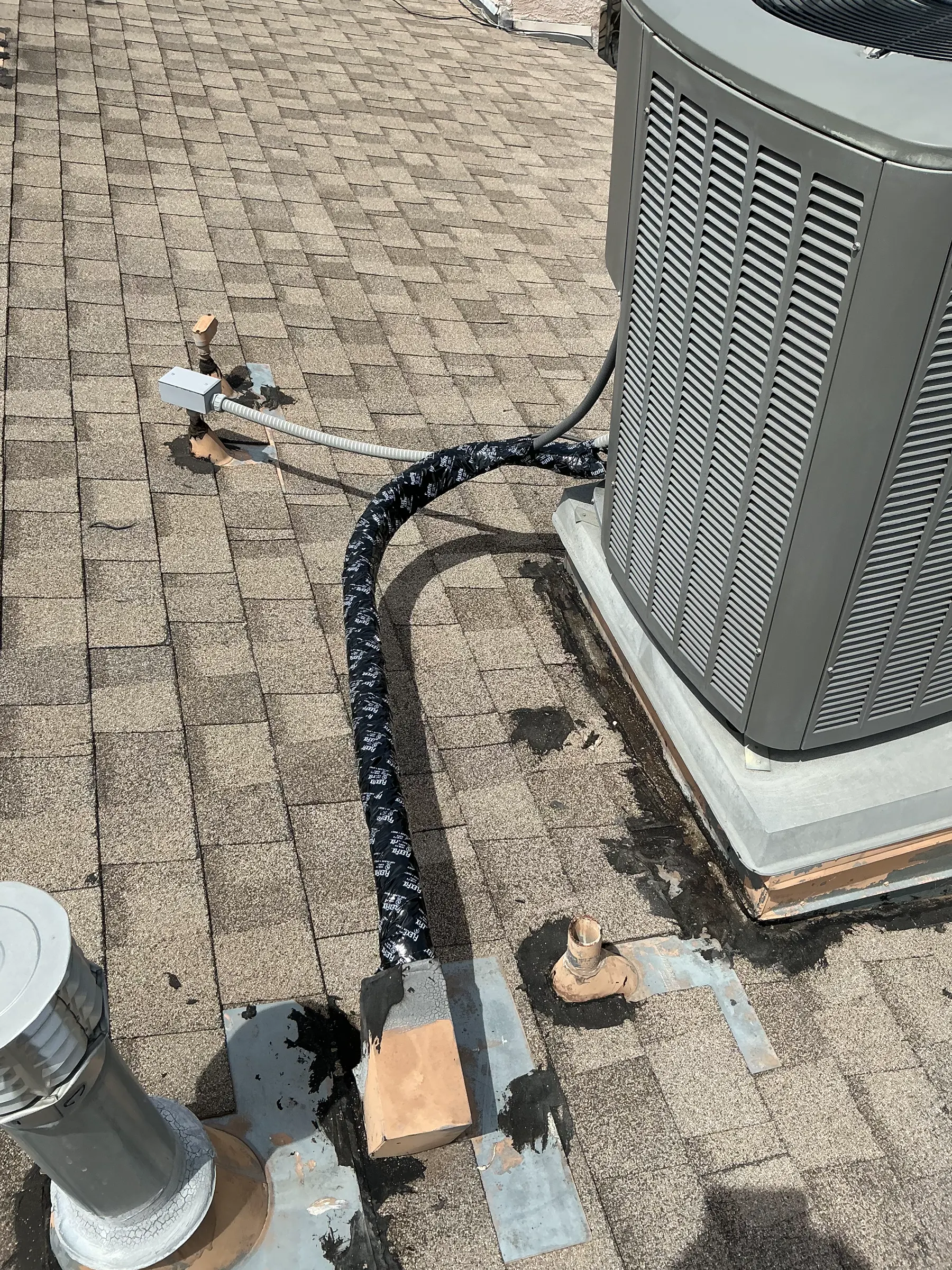 Rooftop HVAC equipment photographed during field work